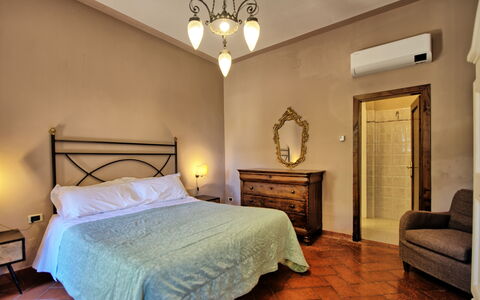 Semesterboende Villa Acciaioli: sovrum