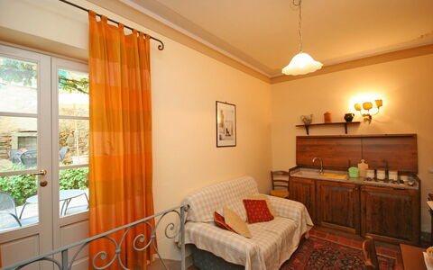 Semesterboende Santo Agostino Glicine: Kök, Lunchrum, Vardagsrum