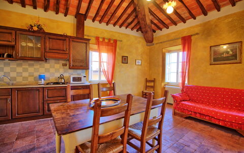 Semesterboende Vescovo: Kök, Lunchrum, Vardagsrum