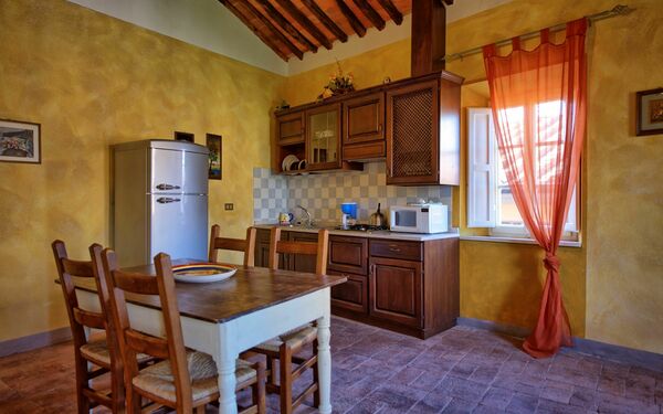 Semesterboende Vescovo: Kök, Lunchrum, Vardagsrum