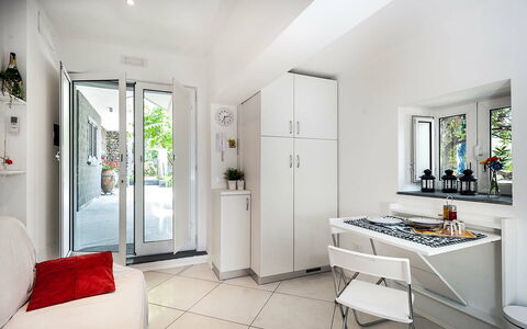 Semesterboende Conchiglia: Kök, Lunchrum, Vardagsrum