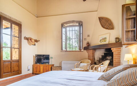 Semesterboende Capanna: sovrum, Vardagsrum