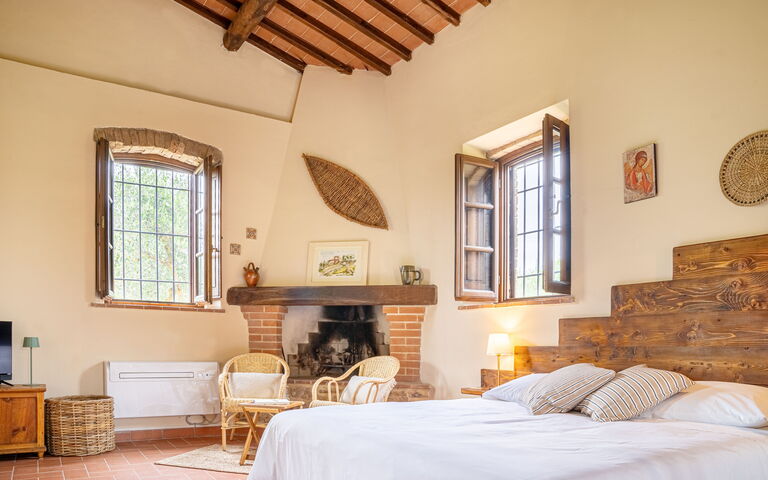 Semesterboende Capanna: sovrum, Vardagsrum