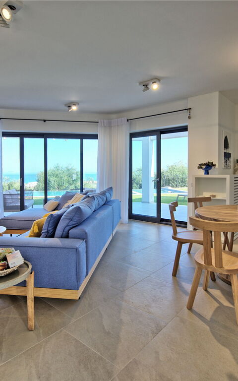 Villa Acropolitana: Kök, Vardagsrum