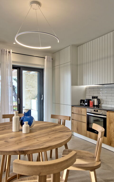 Villa Acropolitana: Kök, Vardagsrum