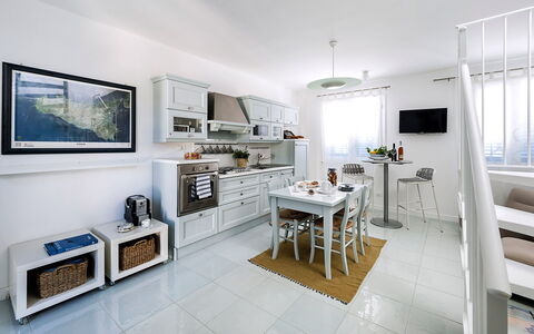 Semesterboende Delfino: Kök, Lunchrum, Vardagsrum