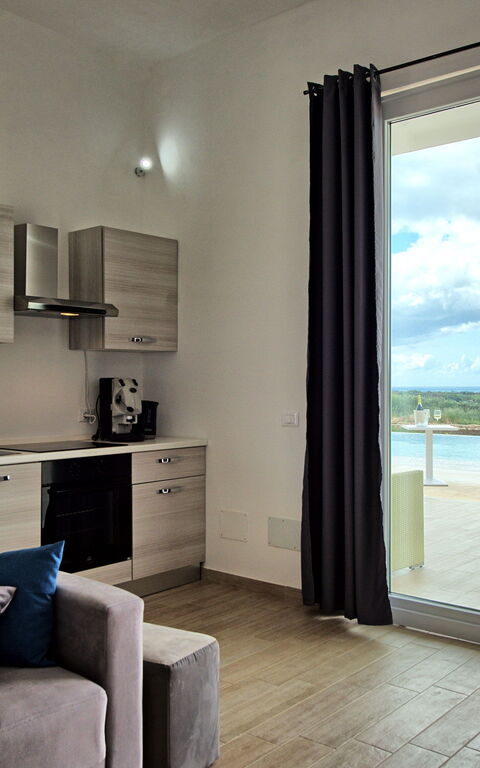 Villa Infinito: Kök, Vardagsrum