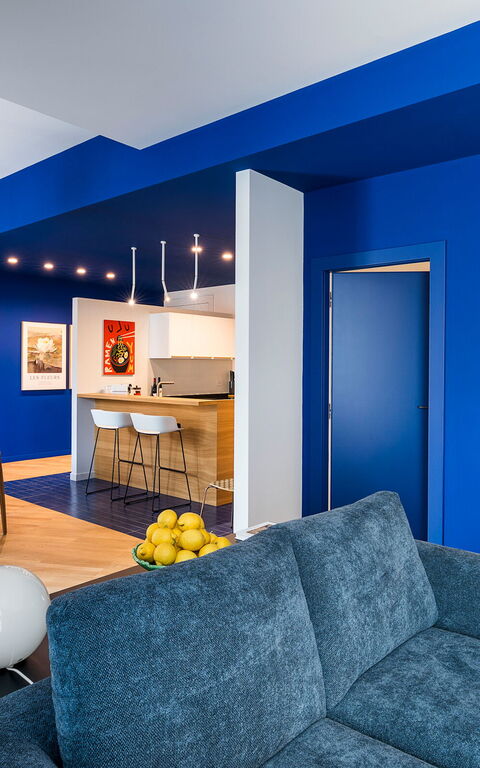 Monumento Apartament: Lunchrum, Vardagsrum