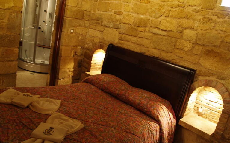 Semesterboende Suite Princess Eleftheria: sovrum